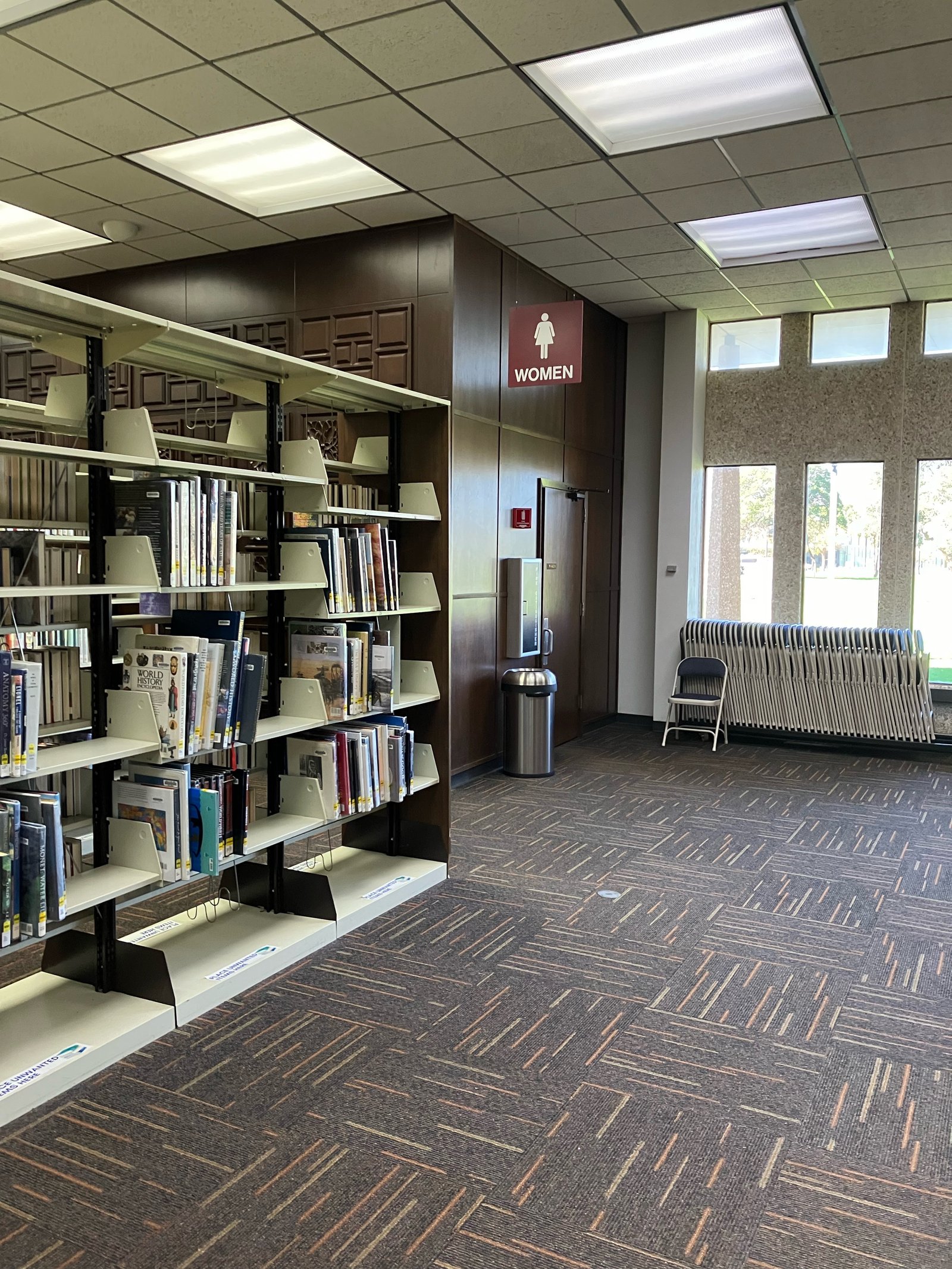 The Local Author Section is by the Women's Restroom at the back right side of the library